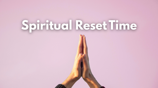 Prayer hands on a pink background with the words "Spiritual Reset Time" above them